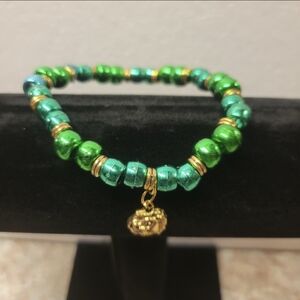 Gold and Green Bead Stretch Bracelet  with Lion Charm